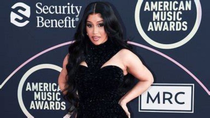 Cardi B’s Blue Satin Bikini & Cutout Furry Boots: Photos – Hollywood Life